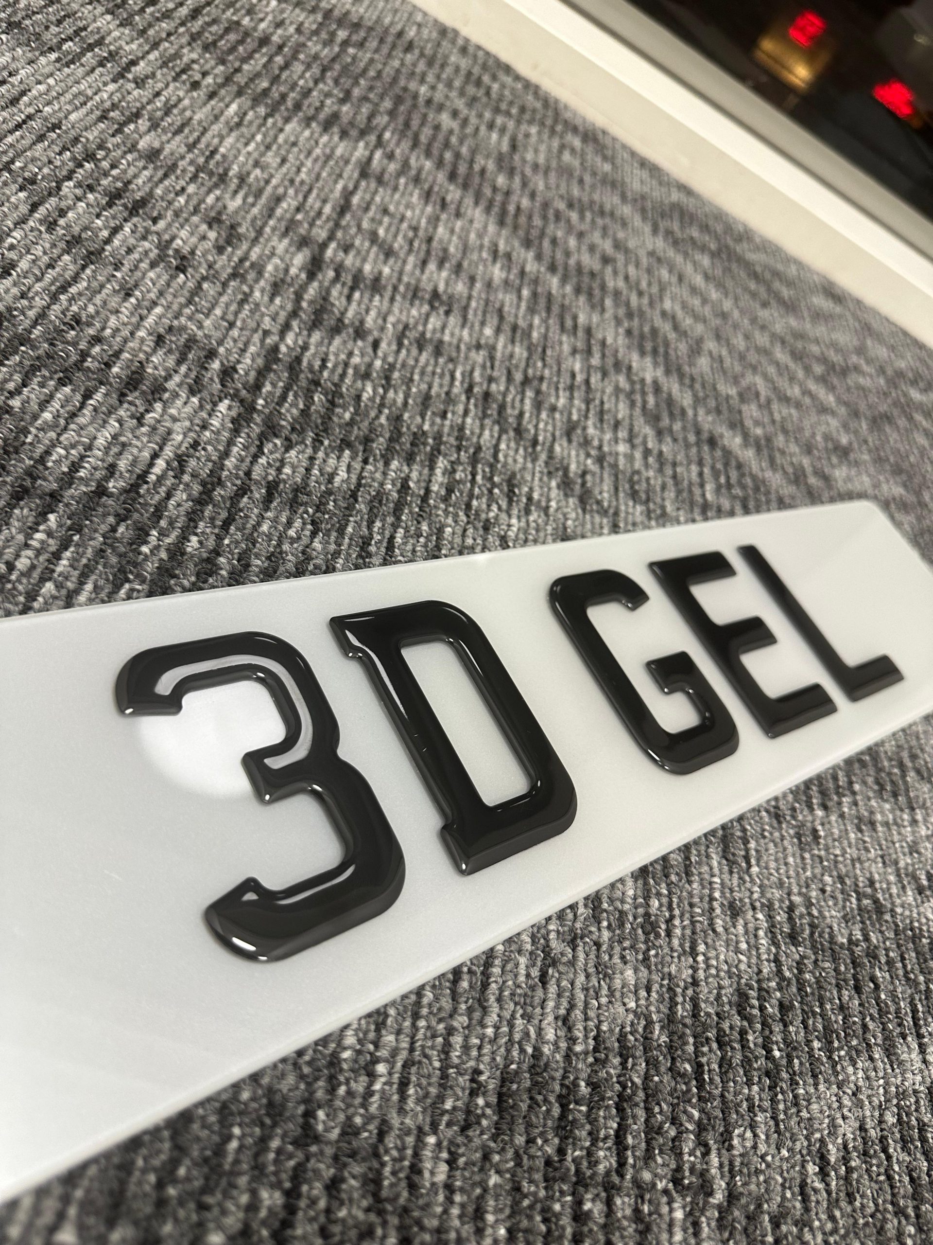 Modern gel number plate showcasing optimal character spacing and professional-grade reflective white backing